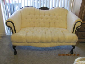 beige old fashioned sofa